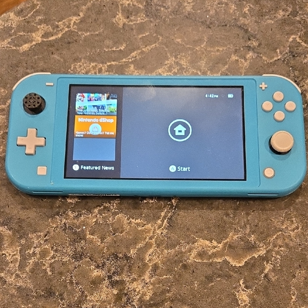 Nintendo Turquoise Handheld Console